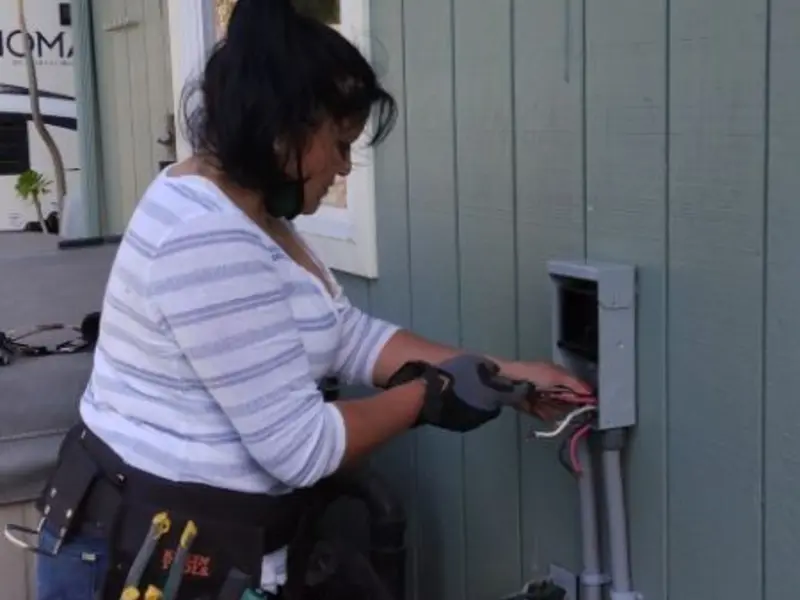 Licensed electrician wiring an exterior subpanel in Pataskala